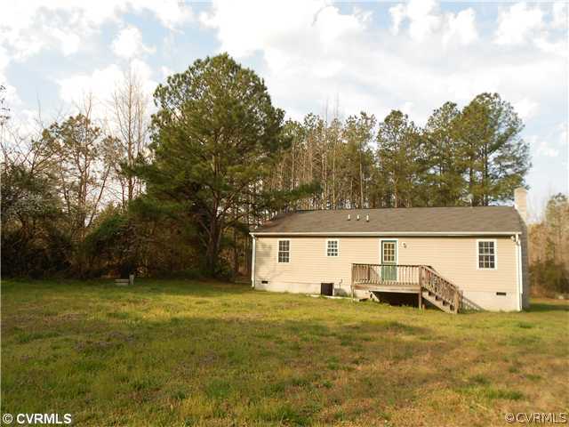 16675 Jolly Road Disputanta, VA 23842 - Photo 6 of 6 a view of a house with a yard
