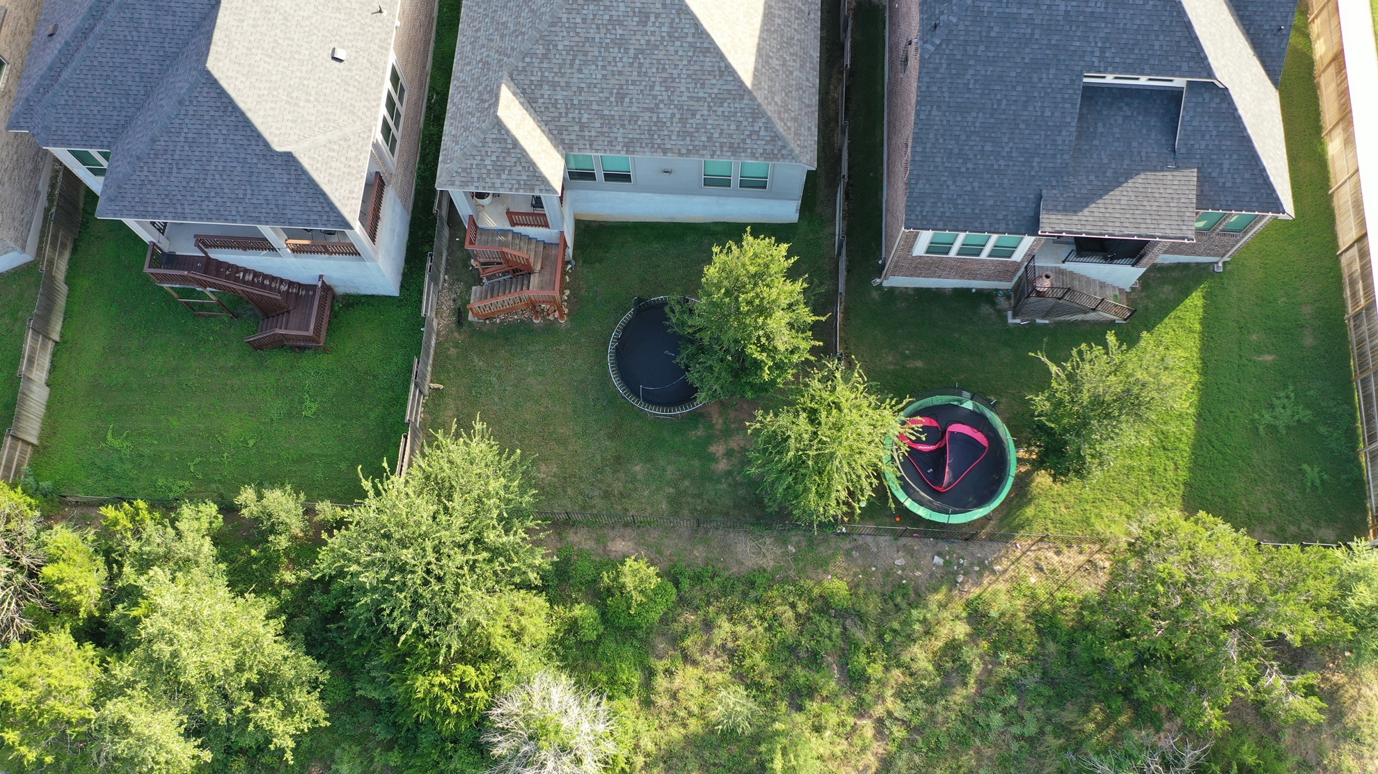 244 Heartleaf Road San Marcos, TX 78666 - Photo 20 of 26 an aerial view of a house with garden