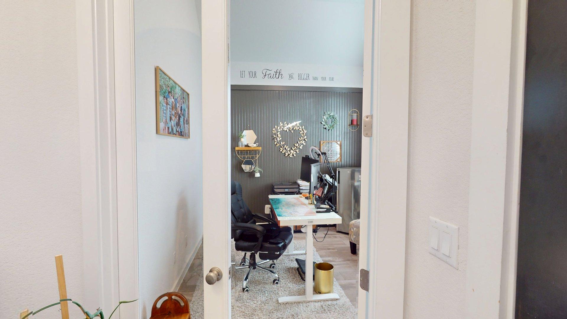 244 Heartleaf Road San Marcos, TX 78666 - Photo 3 of 26 a bathroom with a sink and a mirror