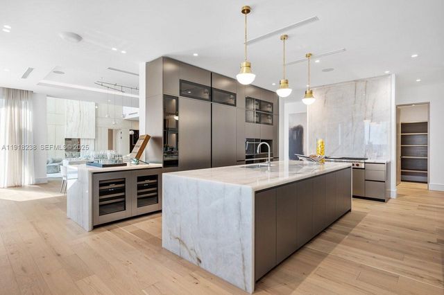 a view of living room with furniture and a large window