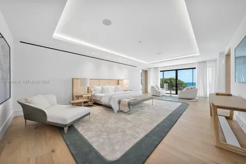 a living room with furniture and windows