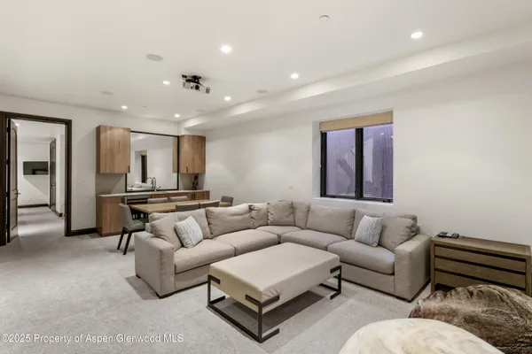 a living room with furniture and a couch