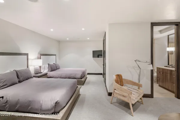 a bedroom with a bed and furniture