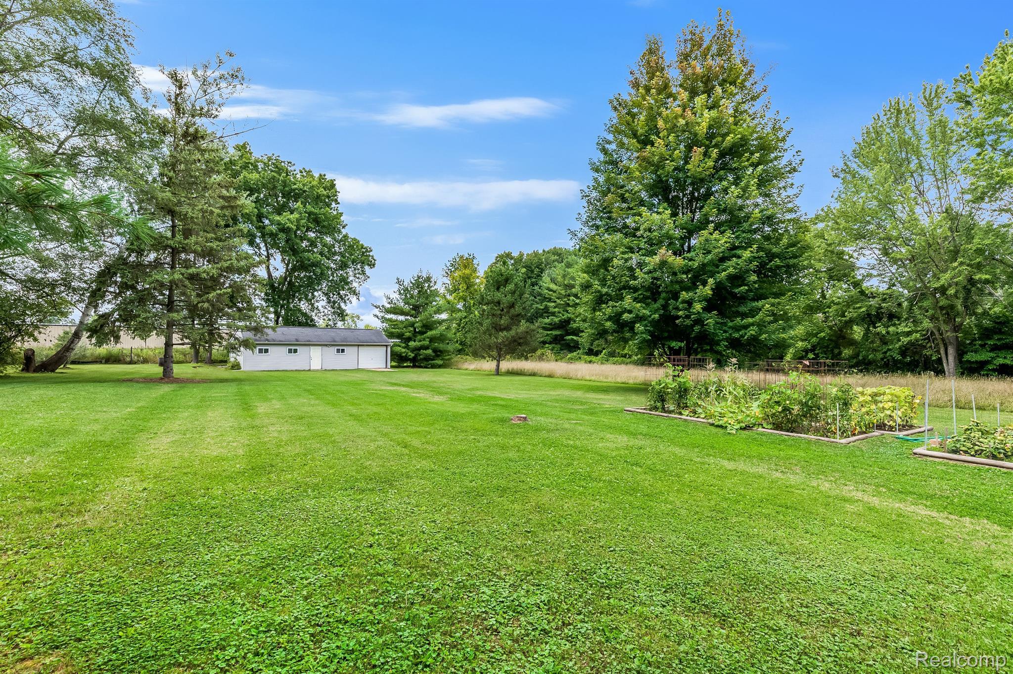 11124 Main Road Fenton, MI 48430 - Photo 27 of 43 Additional yard space beyond fence