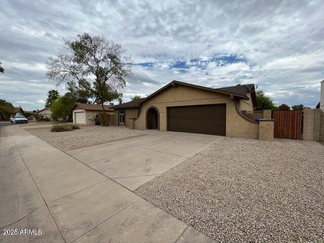 2304 West Temple Street Chandler, AZ 85224 - Photo 4 of 8 a large house with a outdoor space
