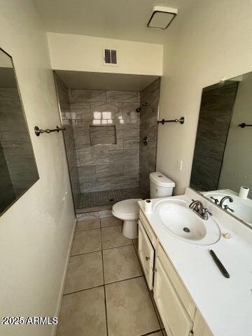 2304 West Temple Street Chandler, AZ 85224 - Photo 8 of 8 a bathroom with a sink a toilet and shower