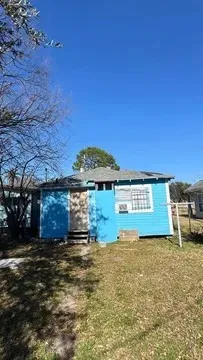 a view of a street with an ocean view