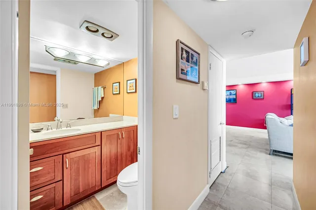 a view of game room with window and furniture