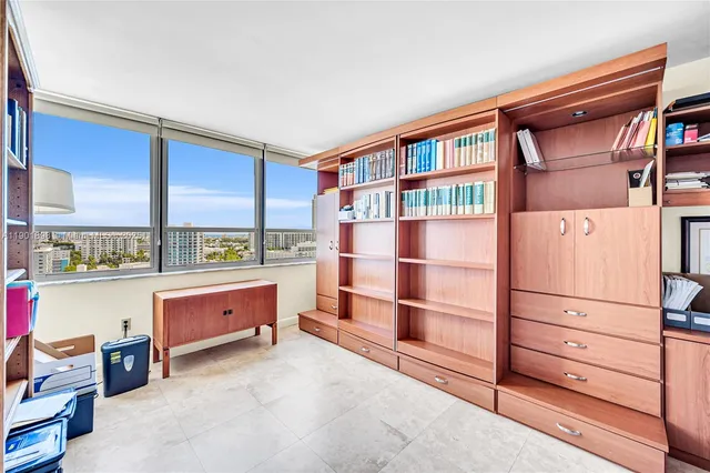 a kitchen with stainless steel appliances granite countertop a stove and more cabinets