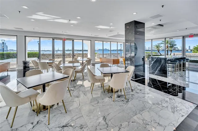 a bedroom with furniture and a wooden floor