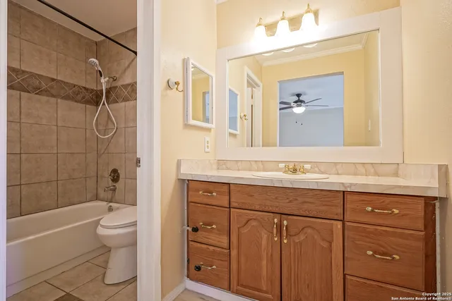 a bathroom with a bathtub and shower