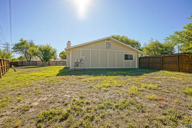 a house with trees in front of it