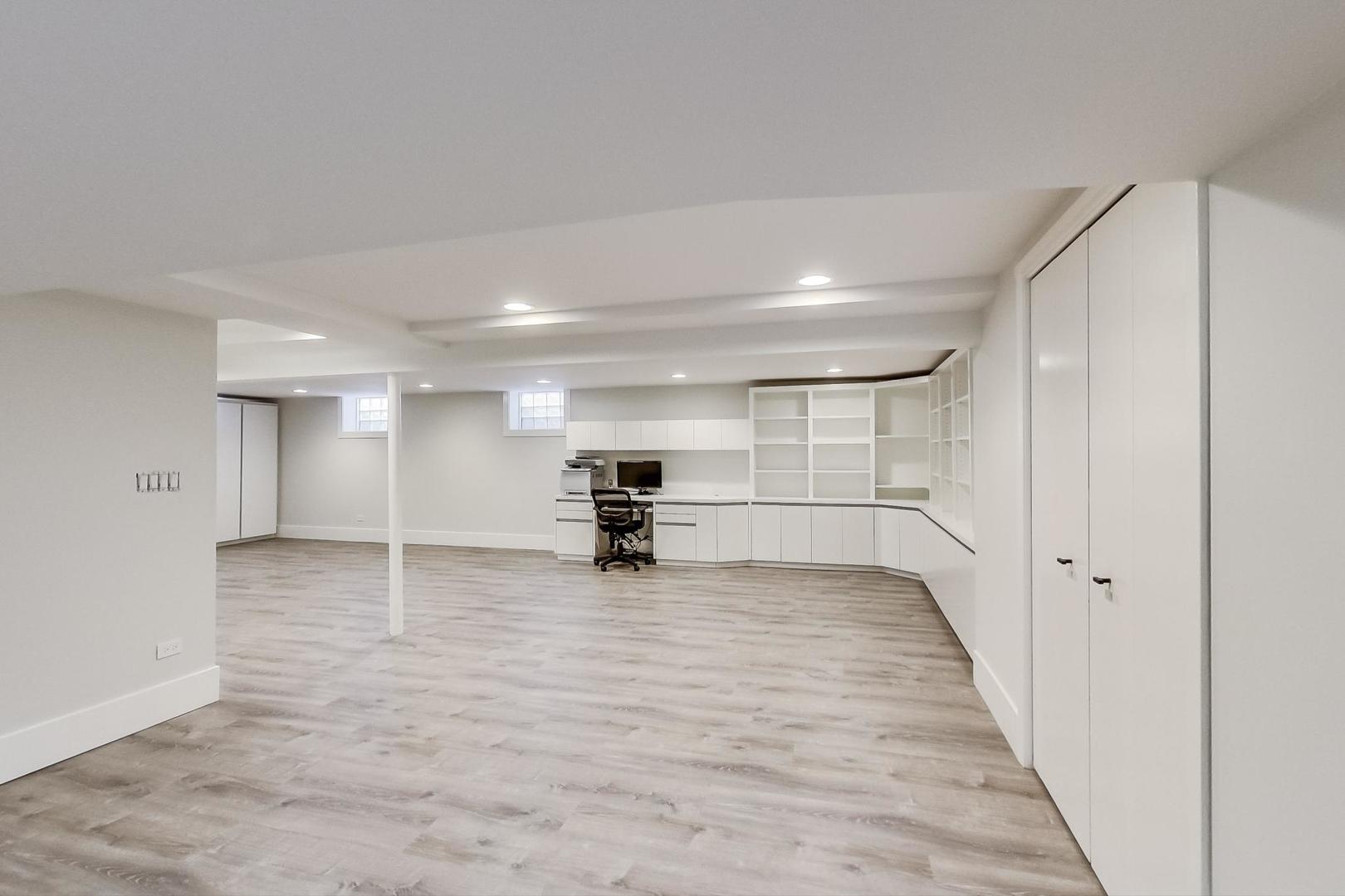 815 Locust Road Wilmette, IL 60091 - Photo 14 of 23 a view of an empty room with wooden floor