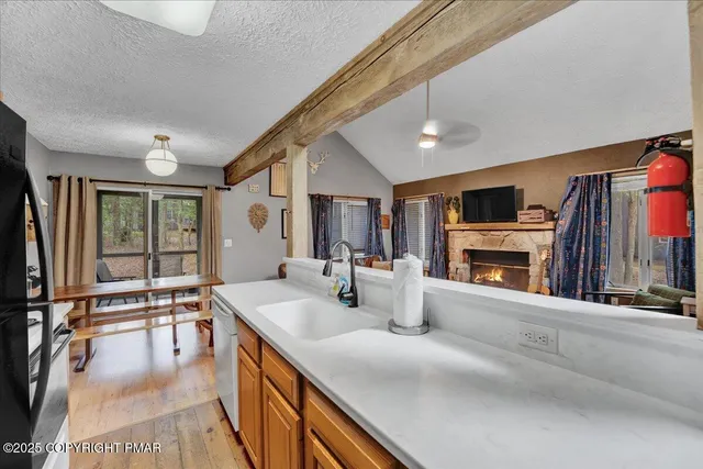 a very nice looking living room with a large window