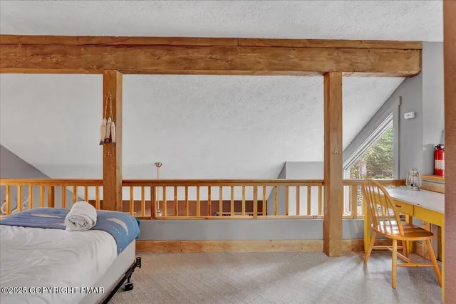 a view of bedroom with furniture