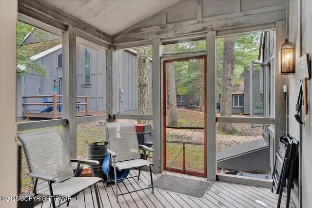 a room with furniture and a window