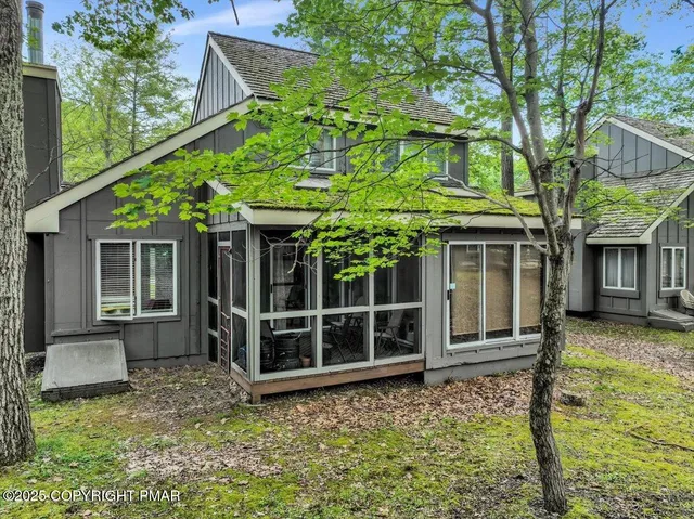 a view of a big yard with lots of green space