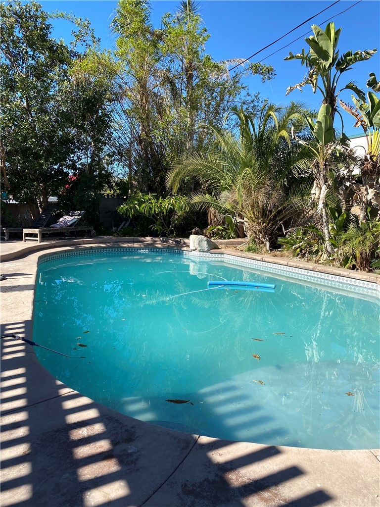 4684 Olive Street Montclair, CA 91763 - Photo 10 of 13 a view of a water pond with green space