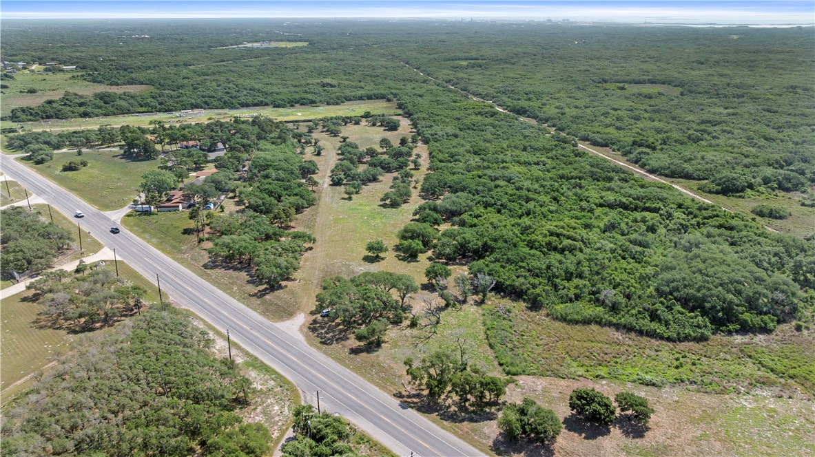 1510 Main Ingleside, TX 78362 - Photo 3 of 10 a view of a lake with a mountain in the background