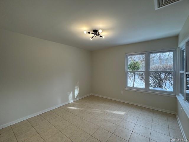 707 Lenox Road Monroe, NY 10950 - Photo 13 of 21 a view of an empty room with a window