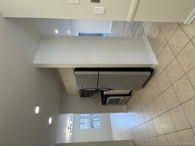 707 Lenox Road Monroe, NY 10950 - Photo 3 of 21 a kitchen with granite countertop a refrigerator and a sink
