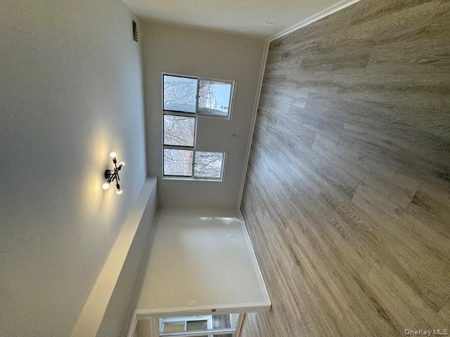 707 Lenox Road Monroe, NY 10950 - Photo 9 of 21 wooden floor in an empty room with a window