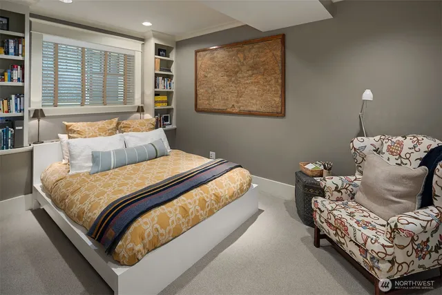 a bedroom with bed and window