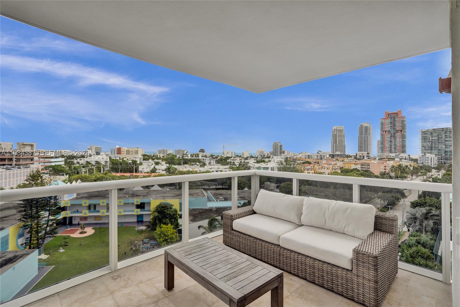400 Alton Road, Unit 911 Miami Beach, FL 33139 - Photo 36 of 47 a view of a terrace with a couch