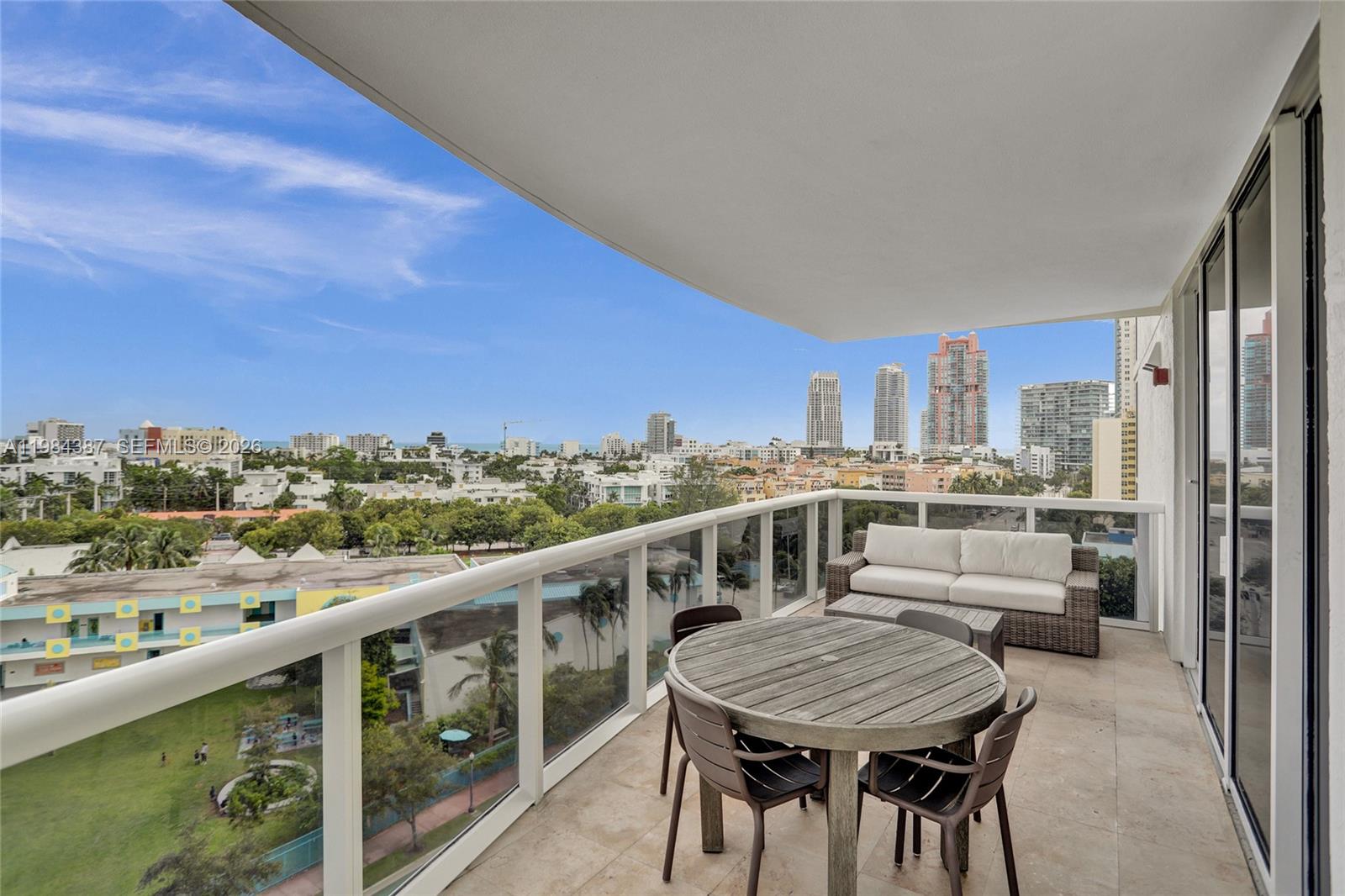 400 Alton Road, Unit 911 Miami Beach, FL 33139 - Photo 42 of 47 a view of a balcony with chairs