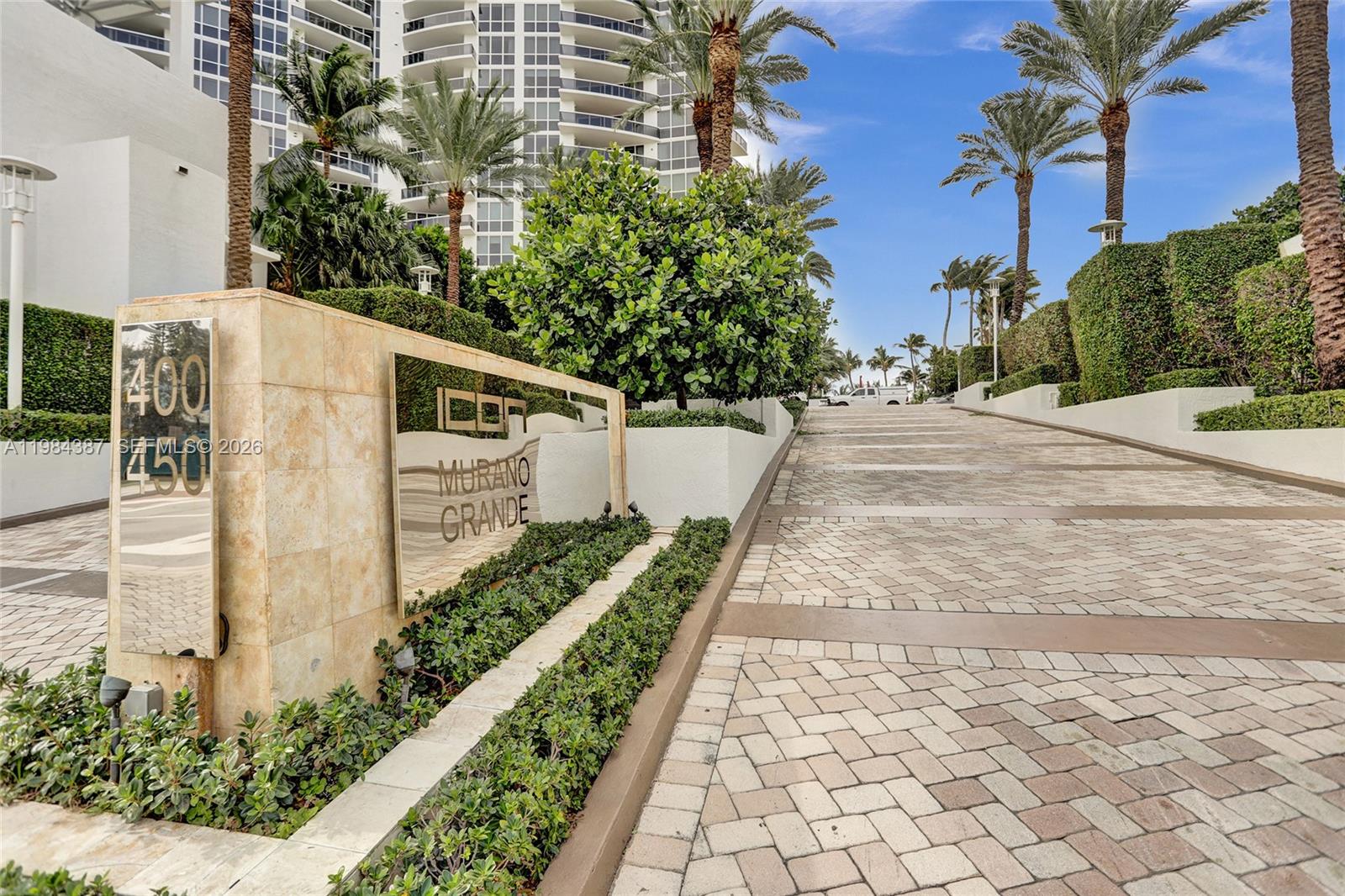 400 Alton Road, Unit 911 Miami Beach, FL 33139 - Photo 46 of 47 a front view of a house with a yard