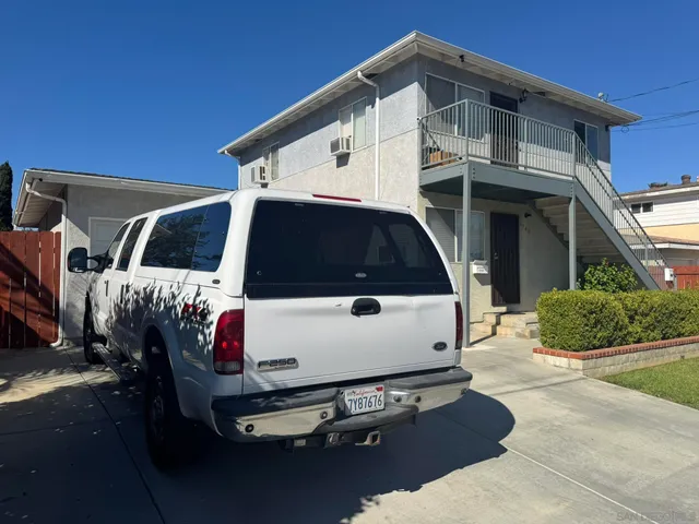 a front view of a house with outdoor space