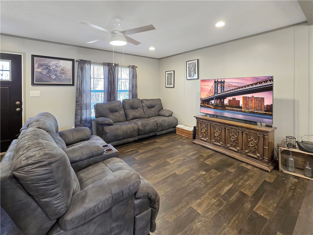 615 Generostee Church Road Starr, SC 29684 - Photo 6 of 20 This inviting living space features warm flooring and ample natural light, perfect for everyday living.