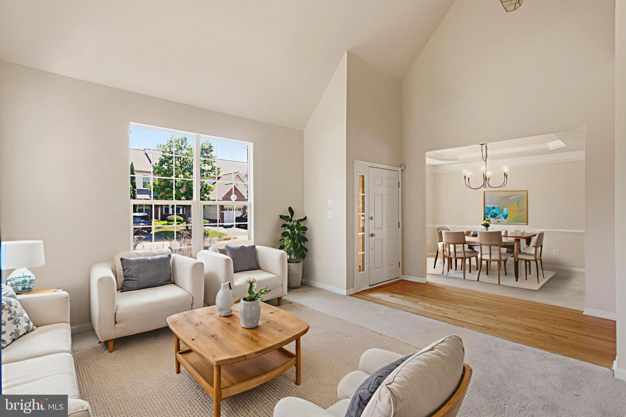 19617 Edgemont Square Ashburn, VA 20147 - Photo 4 of 65 a living room with furniture and a large window