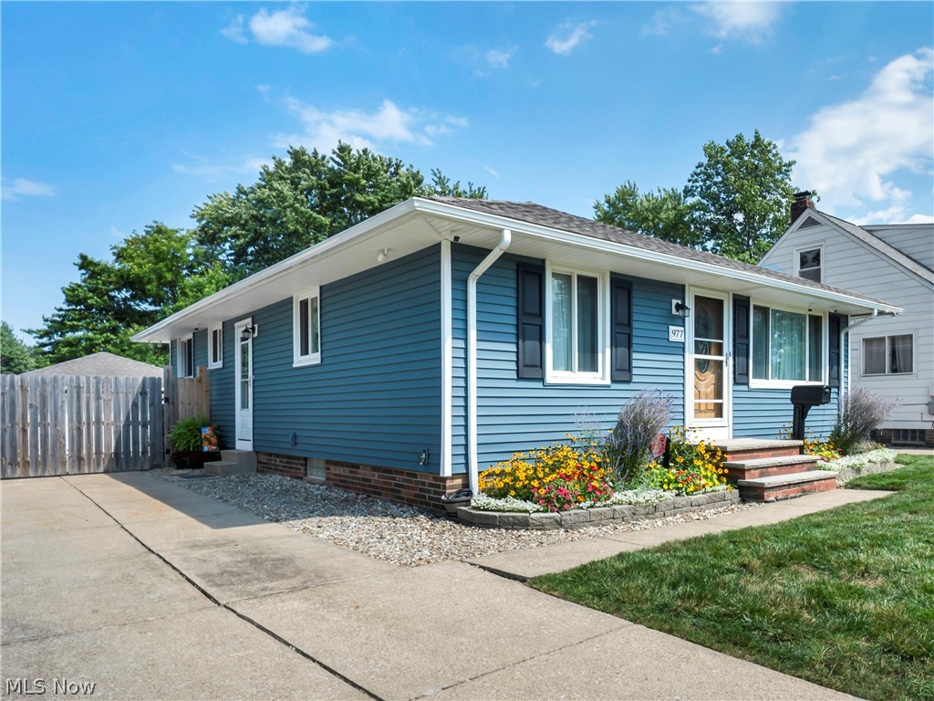 977 Lloyd Road Wickliffe, OH 44092 - Photo 2 of 38 Blue horizontal siding exterior with white trim