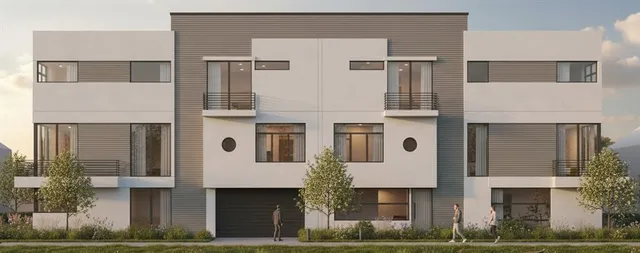 a front view of a building with large windows