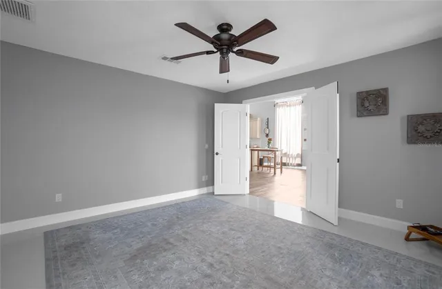 a bathroom with a toilet sink and shower