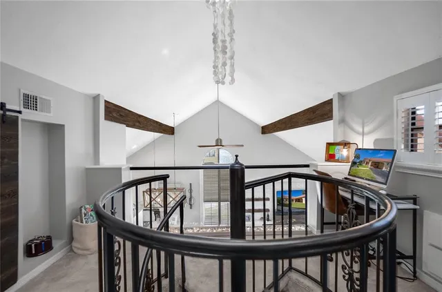 a view of a swimming pool with an outdoor seating and a lake view