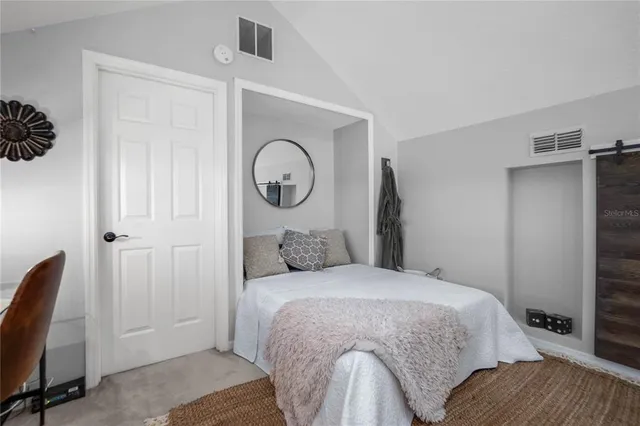 a view of a chairs and table in patio