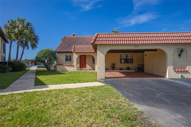 a kitchen with a white cabinets stove and sink