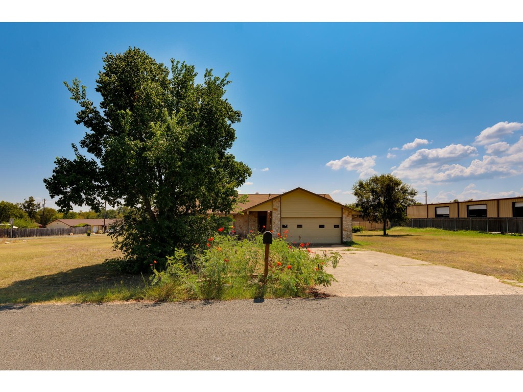 1612 Shenandoah Drive Cedar Park, TX 78613 - Photo 12 of 40 a view of a house with a yard