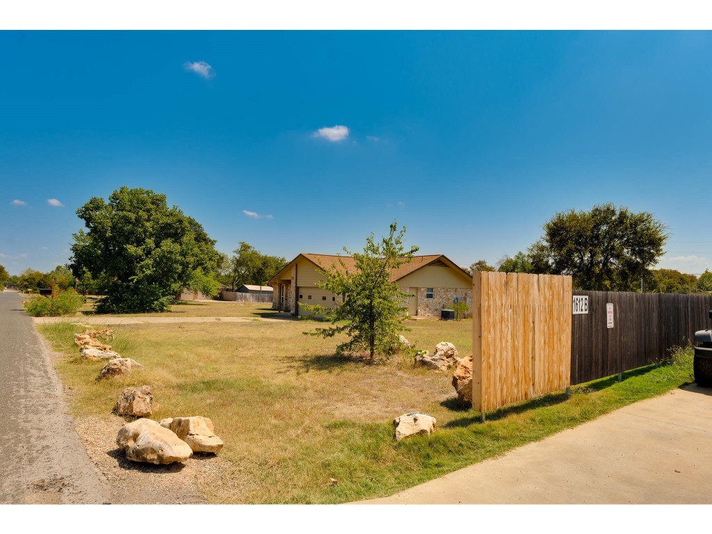 1612 Shenandoah Drive Cedar Park, TX 78613 - Photo 10 of 40 a view of a backyard of the house