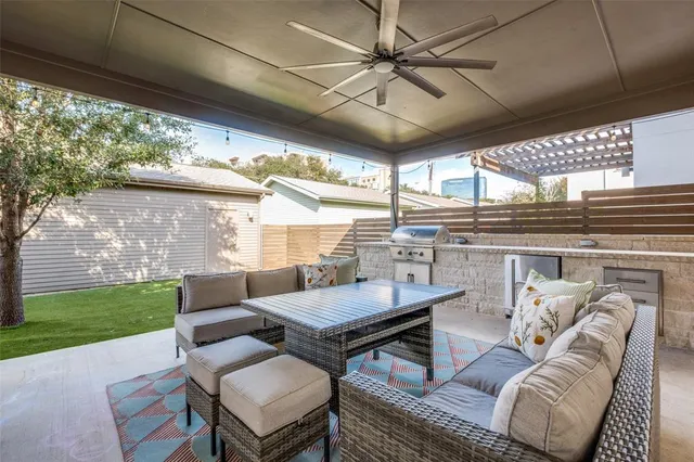 a outdoor living space with furniture and garden view