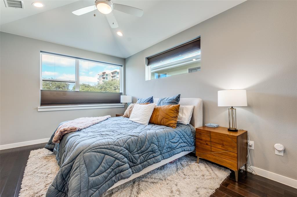 5311 Anita Street Dallas, TX 75206 - Photo 14 of 20 a bedroom with a bed and a window