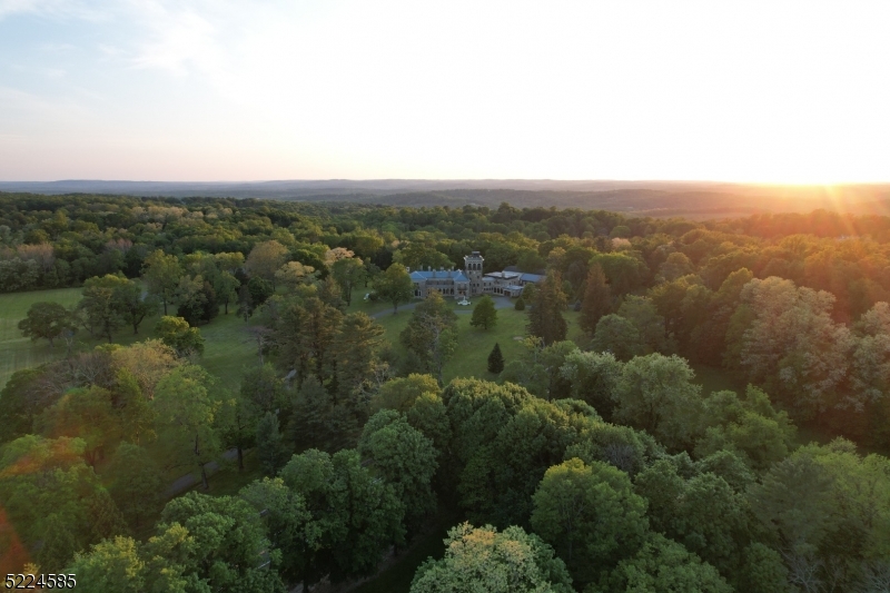 450 Claremont Road Bernardsville, NJ 07924 - Photo 47 of 47 an aerial view of house with yard and mountain view in back