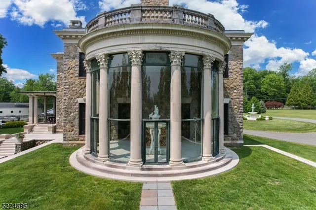 a view of a house with a yard balcony