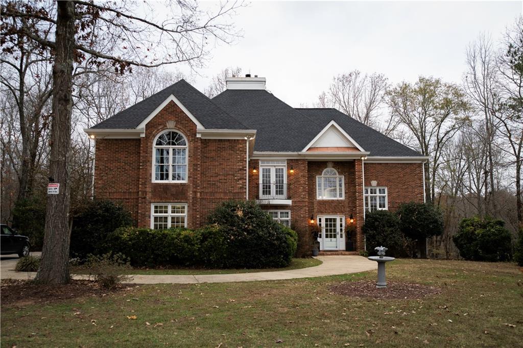 338 Bellview Road Rockmart, GA 30153 - Photo 1 of 1 a front view of a house with garden