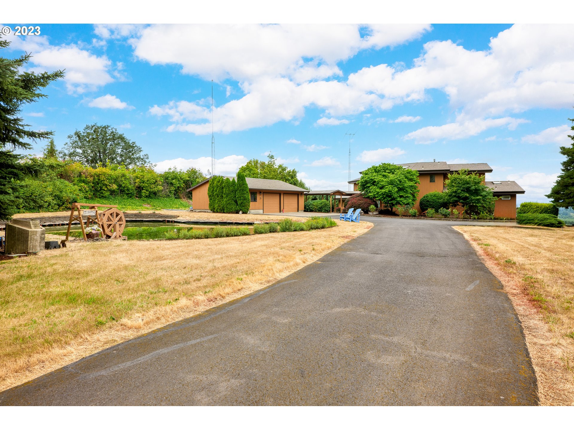 30875 Southwest Laurelview Road Hillsboro, OR 97123 - Photo 1 of 36 a view of swimming pool with a yard