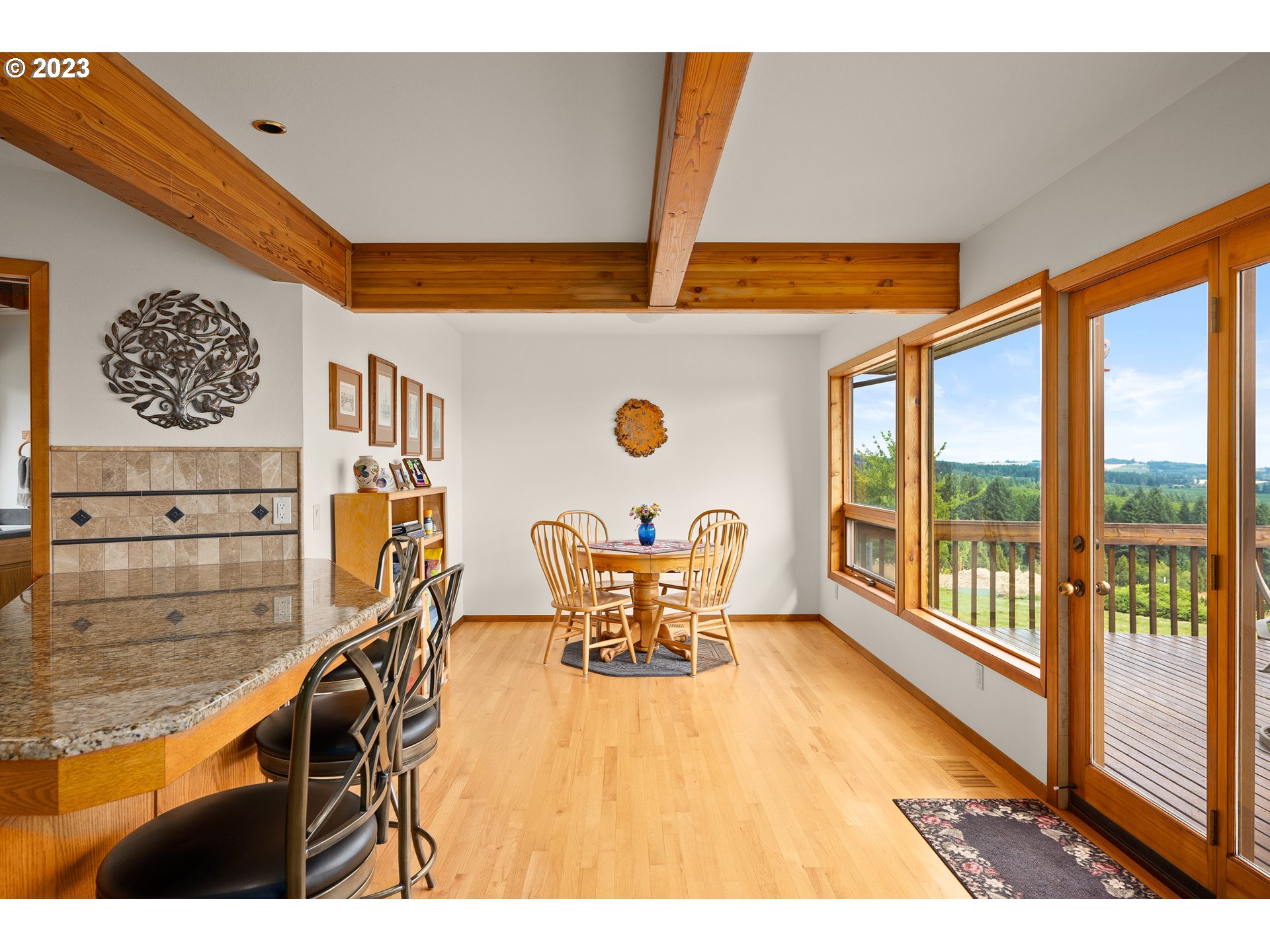 30875 Southwest Laurelview Road Hillsboro, OR 97123 - Photo 13 of 36 a view of seating area with furniture and wooden floor