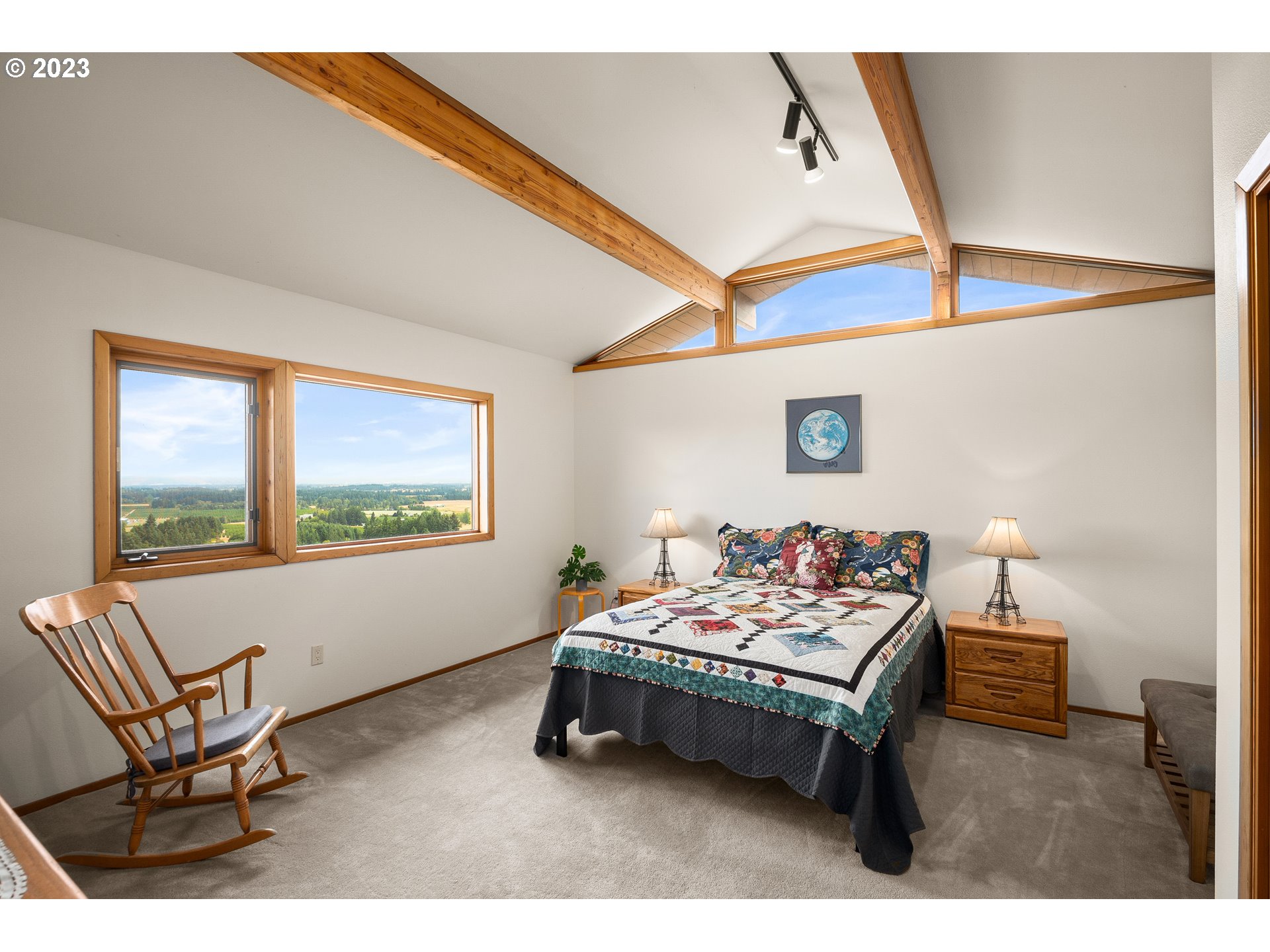 30875 Southwest Laurelview Road Hillsboro, OR 97123 - Photo 26 of 36 a bedroom with furniture and window