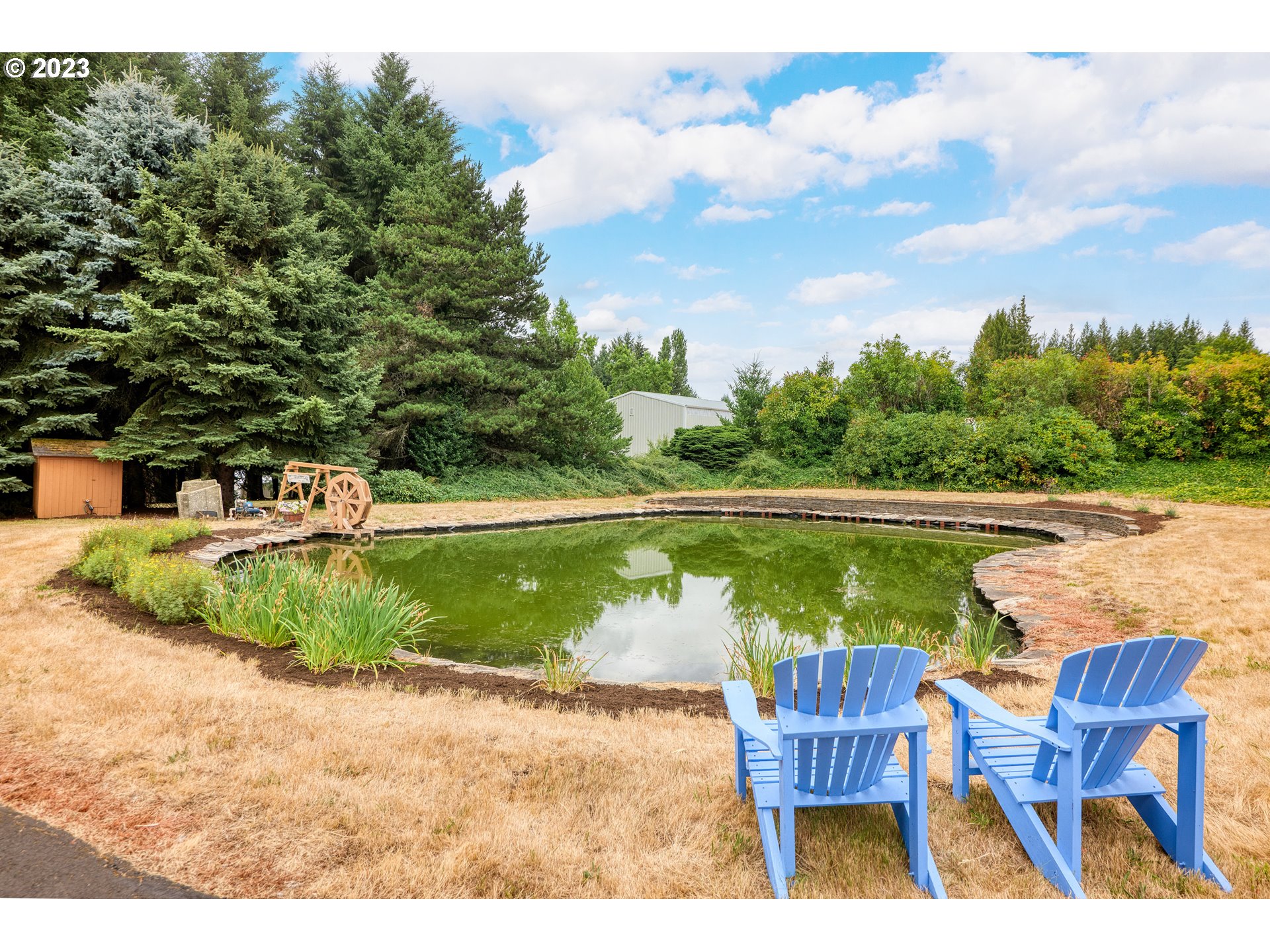 30875 Southwest Laurelview Road Hillsboro, OR 97123 - Photo 34 of 36 a view of swimming pool and lake view